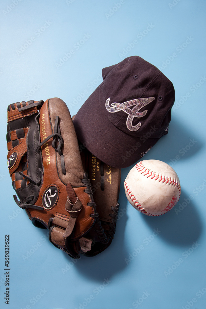 Atlanta Braves MLB Ball Cap and SPN Softball and Rawlings Glove