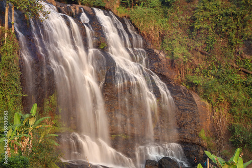 the swift water of the cikondang waterfall.