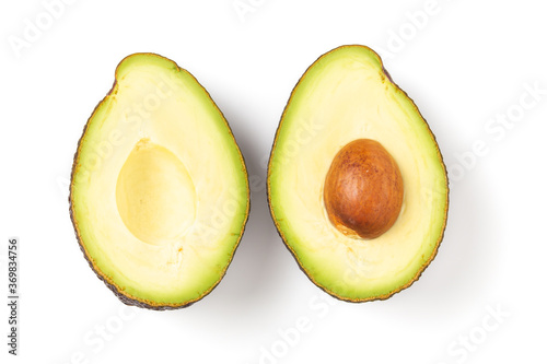 Two slices of avocado isolated on white background