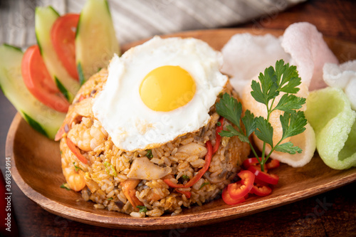 Canvas Print nasi goreng, indonesian fried rice on wooden plate