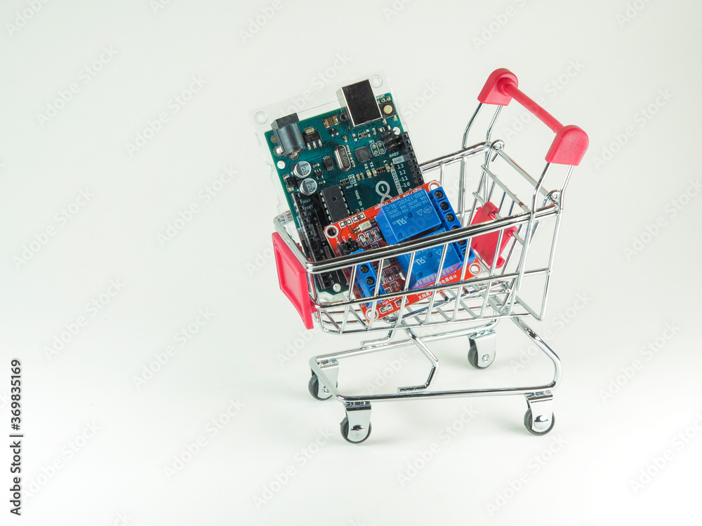 Arduino control board in small shopping cart for online concept idea