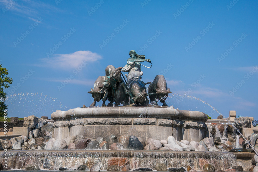 Gefion Fountain in Copenhagen at summer from below, public square fountain in copenhagen