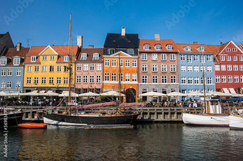 Buildings and the canal of Nyhavn district in Copenhagen  Denmark  panoramic view of Nyhavn