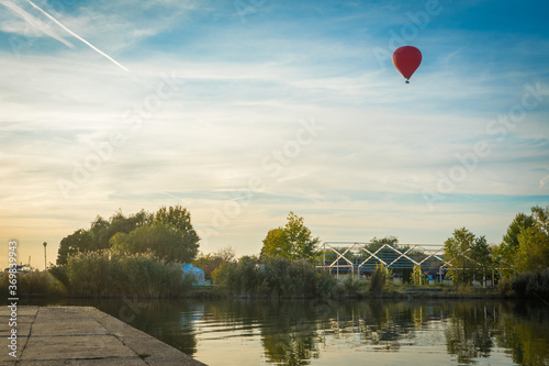Hot air balloon over the Lake Velence, Village lake and hot air balloon