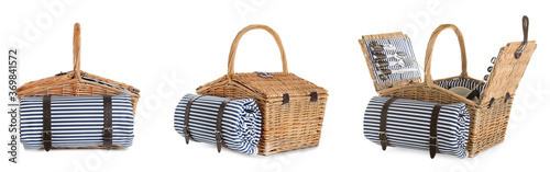 Set of wicker baskets with picnic essentials and blanket on white background, banner design photo