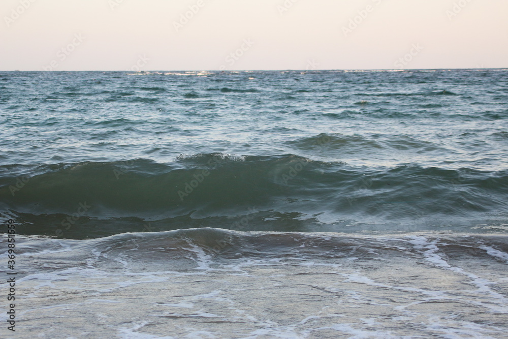 Water flowing on the beach