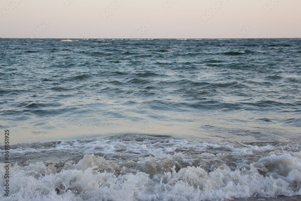 Water flowing on the beach