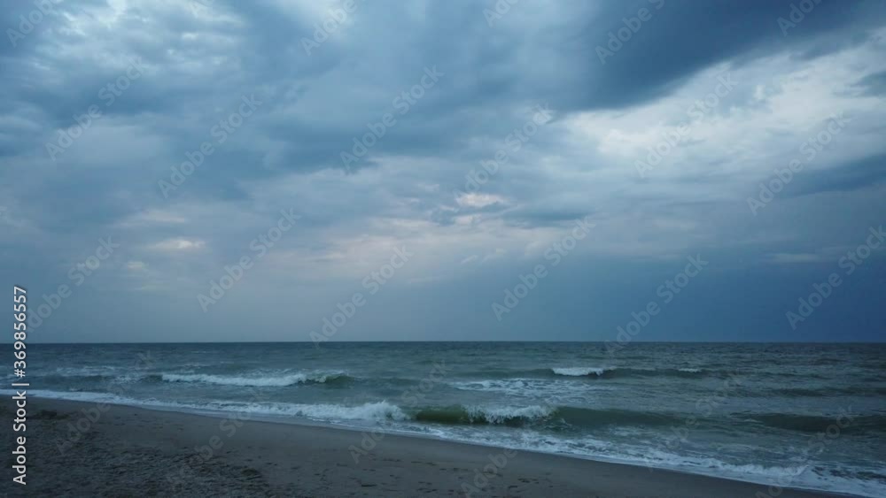 Sea beach and storm clouds over the sea. Sea beach and storm clouds over the sea.