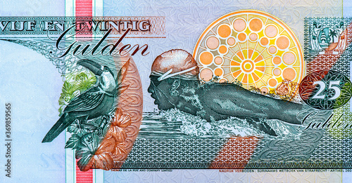 Arms at upper right, Competition swimmer (Olympian Anthony Neste) in butterfly, Portrait from Suriname 25 Guldens 1998 Banknotes.