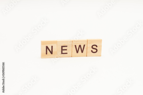 NEWS words on wooden blocks. Wooden cubes word news concept