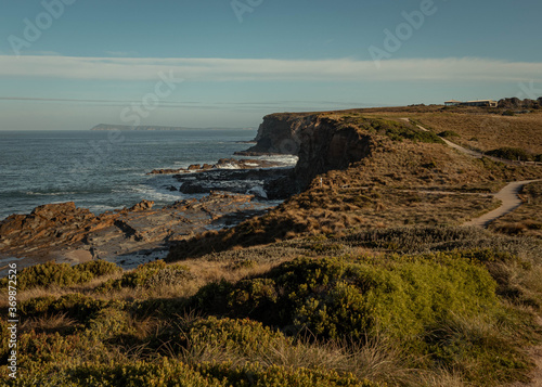 Path following the cliffs in Australia, scenic view over to the ocean