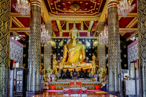 Gold buddha statue at at Phra Si Rattana Mahathat temple, Phitsanulok, Thailand . Beautiful of historic city at Buddhism temple. © Pungu x
