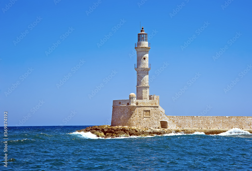 Chania embankment with old lighthouse at the background on Crete, Greece