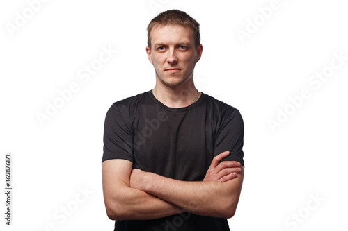 Fotografie Photo of man with scar on lip with arms crossed