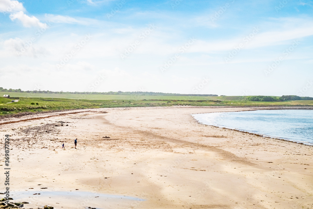 A beach at the north coast of Scotland, on a sunny day. A beach at the north coast of Scotland, on a sunny day.