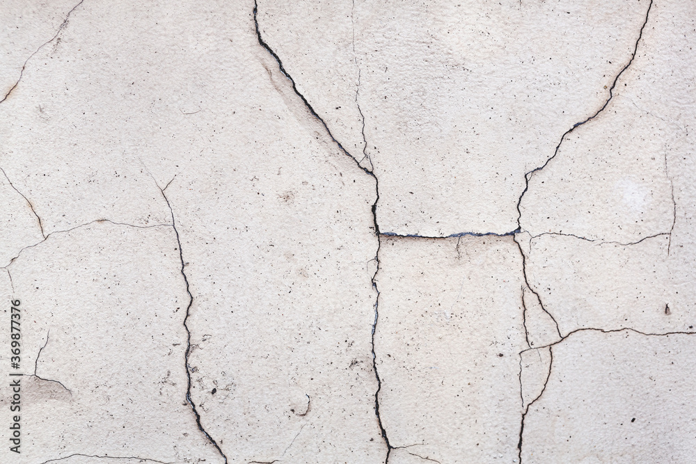 Obraz premium Abstract concrete, weathered with cracks and scratches. Landscape style. Great background or texture.
