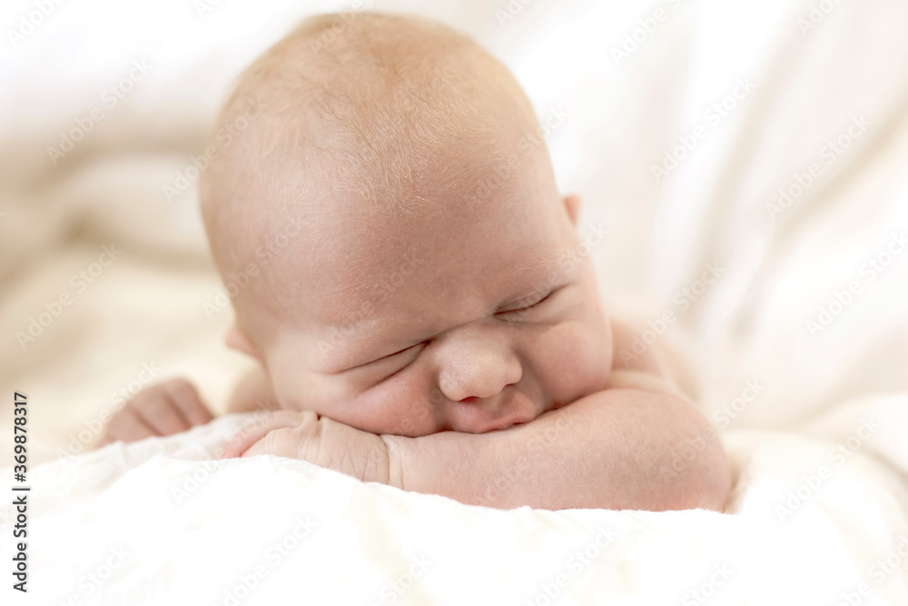 Portrait of a sleeping newborn baby close-up