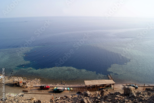 Top view of the Blue hole in Dahab (Egypt, South Sinai). Ripples on the water. Natural curvature of the horizon line