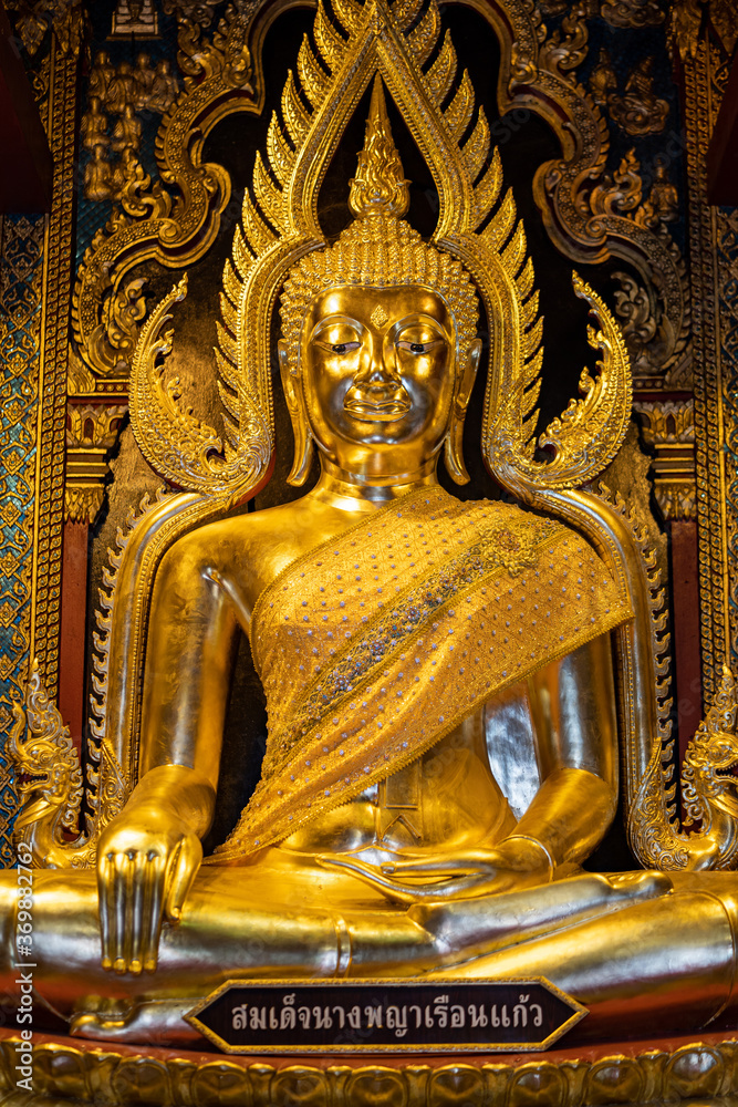 Phitsanulok, THAILAND -  August 6, 2020: Somdet Nang Phaya Ruean Kaew is the name of Buddha Statue in a chapel of Nang Phaya Temple, Phitsanulok province.