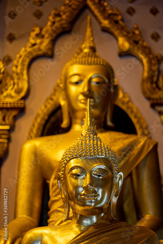 Phitsanulok, THAILAND -  August 6, 2020: Somdet Nang Phaya Ruean Kaew is the name of Buddha Statue in a chapel of Nang Phaya Temple, Phitsanulok province. © chongsiri