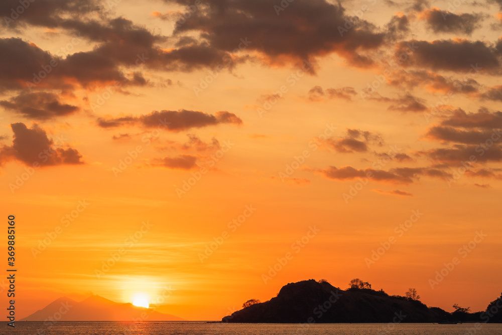 Cloudy sunset over ocean and islands, Indonesian wilderness
