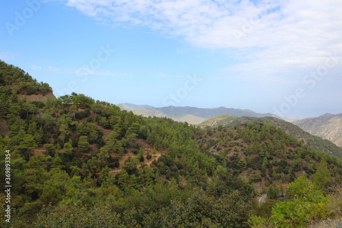 Troodos mountains from the observation platform of the Kykkos monastery against the blue sky. Cyprus.