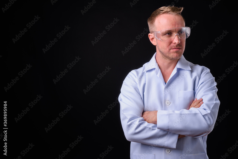 Portrait of handsome blond man doctor as scientist Portrait of handsome blond man doctor as scientist