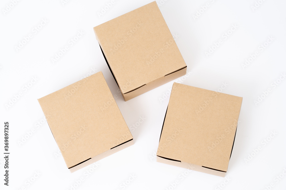 Brown paper box for food package. carton on a white background. Brown paper box for food package. carton on a white background.