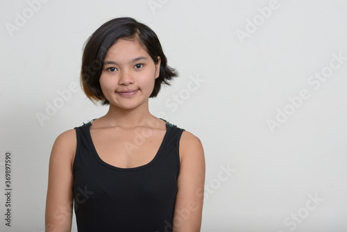 Portrait of young Asian teenage girl with short hair © Ranta Images