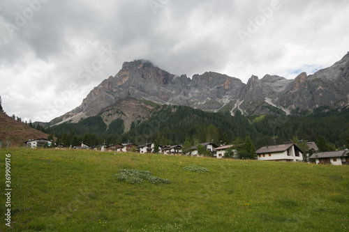 View of San Martino di Castrozza mountain town during summer day in Trentino, Italy