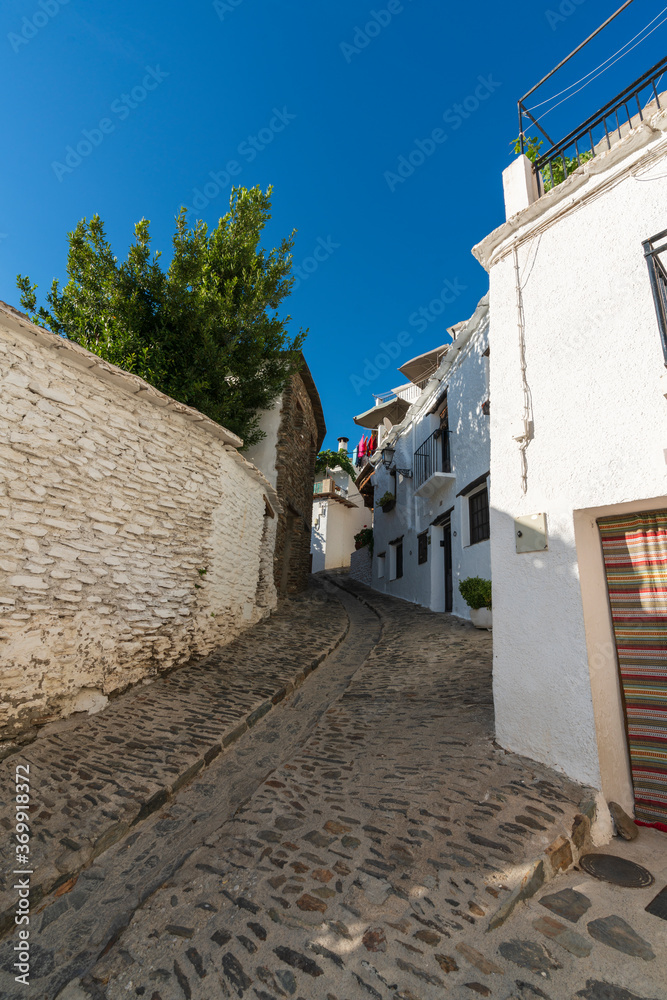 narrow street of a town in southern Spain