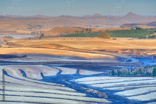 Obraz na plátně FIRE BREAK BURNING ETCHES THE LANDSCAPE  Ngagwana valley, southern drakensberg,