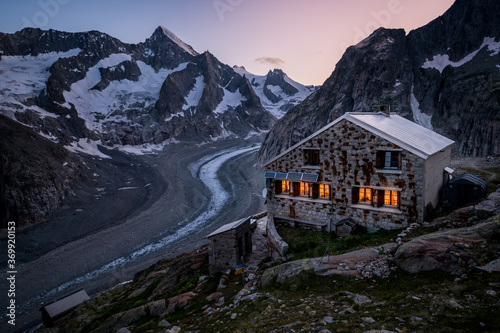 blue hour at an alpine hut in the swiss alps