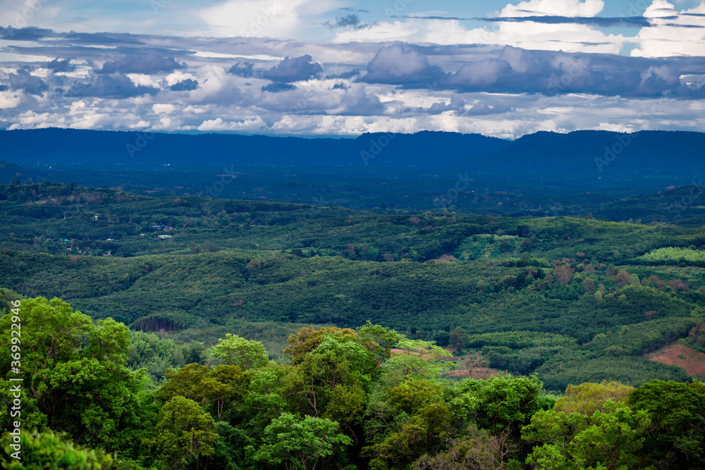 Fototapeta premium Natural high angle panoramic background With an atmosphere surrounded by mountains and trees, with a blurred wind, cool