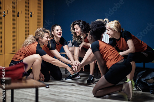 Female team building up the spirit for the game