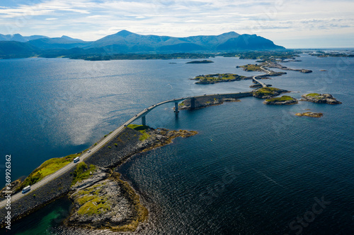 Cars crossing bridges on Atlanterhavsvegen, scenic coastal highway, west coast of Norway photo