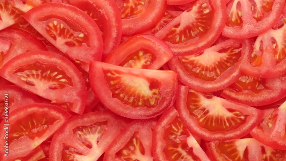 pieces of red tomatoes rotating top view pieces of red tomatoes rotating top view