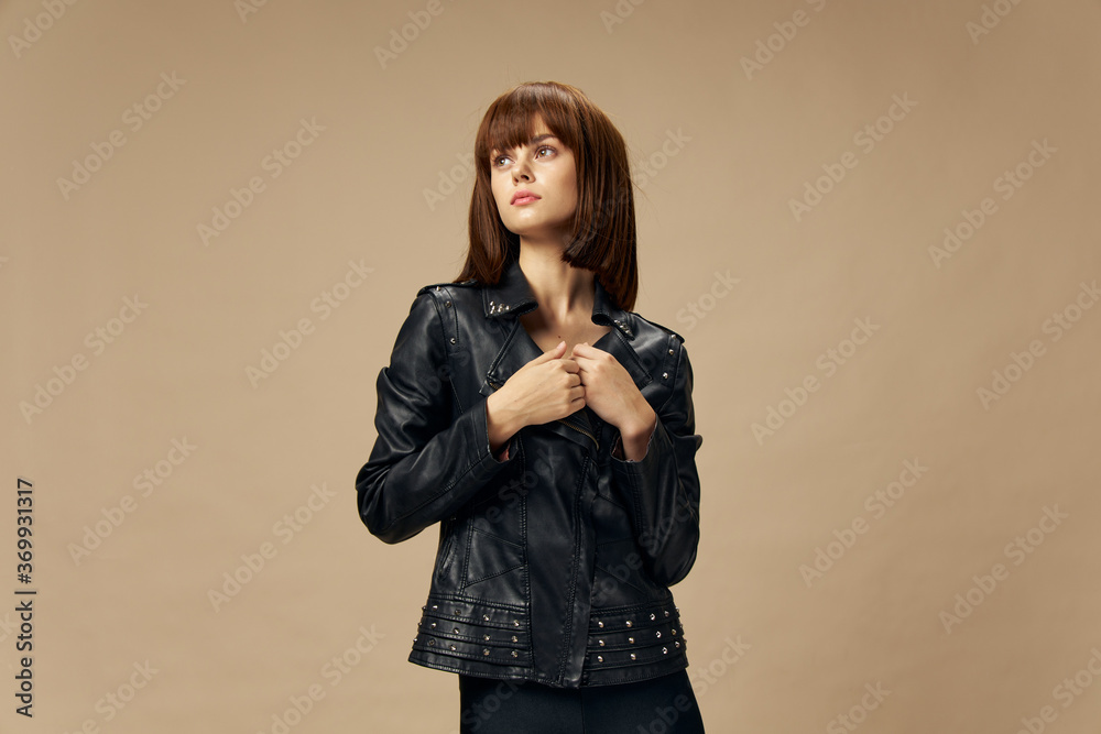 Fashion woman model posing beige background. Beautiful skin and hair caret Fashion woman model posing beige background. Beautiful skin and hair caret