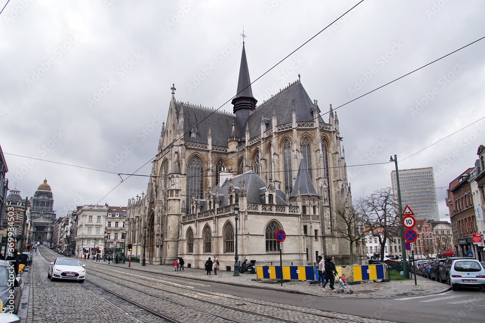 Beautiful ancient Church of Our Blessed Lady of the Sablon located in the Sablon/Zavel district in the historic centre of Brussels. View from the Petit Sablon garden.