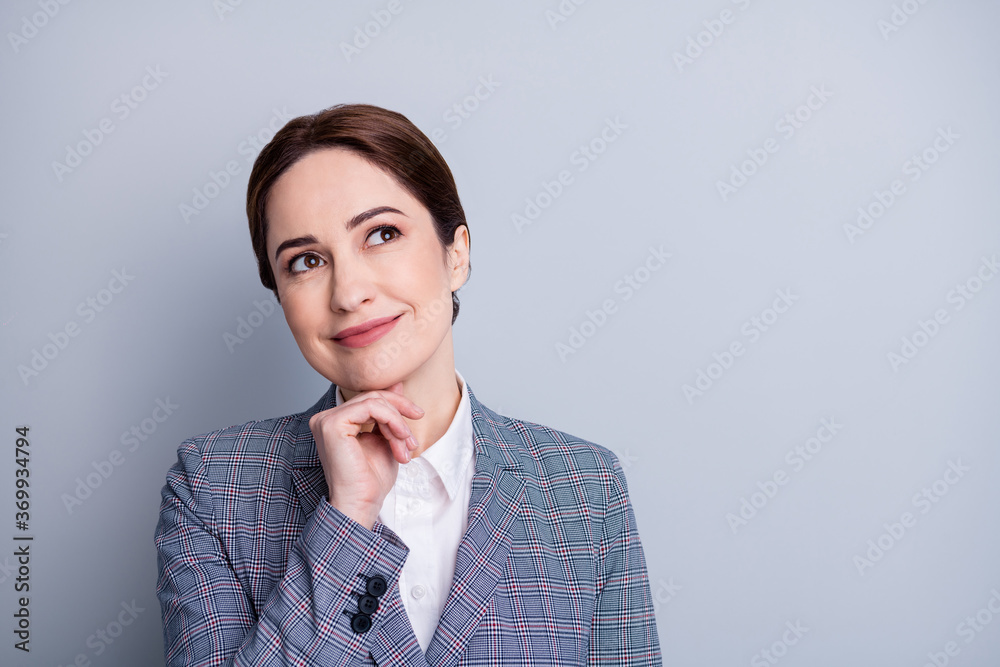 Closeup photo of attractive business lady good mood teacher look interested up empty space hand on chin planning future lesson wear plaid blazer white shirt isolated grey color background Closeup photo of attractive business lady good mood teacher look interested up empty space hand on chin planning future lesson wear plaid blazer white shirt isolated grey color background