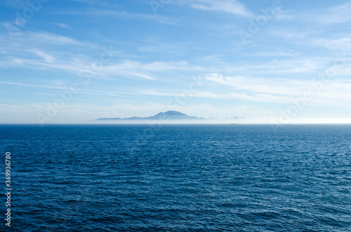 View of Strait of Gibraltar from British overseas territory Gibraltar. Morocco and mount Jebel Musa on the background.
