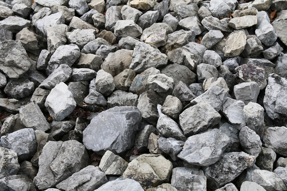 pile of odd shaped natural stone block boulders rocks