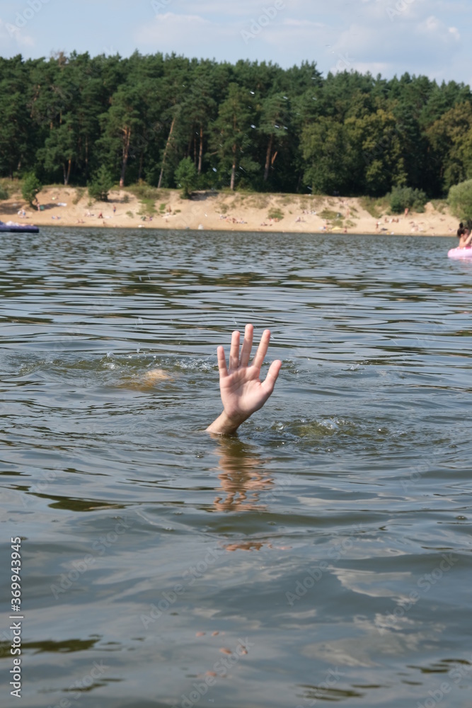 The man is drowning in water. Place for text.
The man is drowning in water. Place for text.