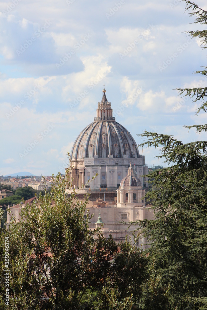 Dome of St. Peter Basilica, View from the top in Gianicolo hill  Rome on cloudy day . Aerial picturesque view of Rome .Vatican museum, Rome cityscape.