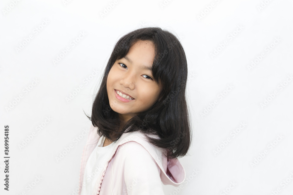 Asian cute young girl with bright face on white background
Asian cute young girl with bright face on white background