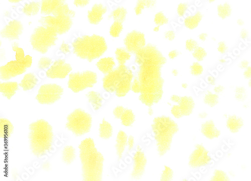 Handmade painting. Yellow watercolor spotted splash abstract on paper background texture. Backdrop, flat lay, overlay, artwork concepts. Copy space. Original artwork.