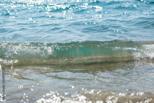 Wave of the Sea on a Beach