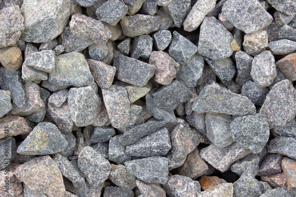 Abstract background with gray dry stones. Crushed stone. Abstract background with gray dry stones. Crushed stone.