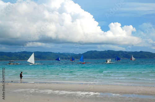 Beach shore and sail boats at Boracay Island in Aklan, Philippines © walterericsy