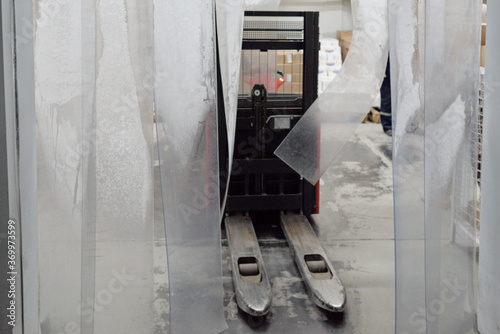 Forklift Going To Freezer photo